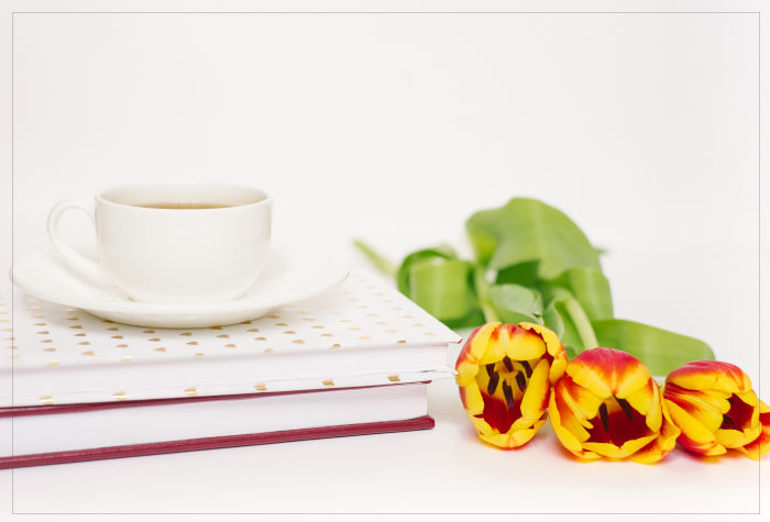 coffee cup notebook tulips
